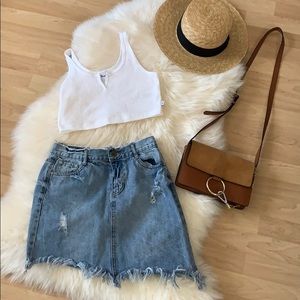 Asymmetrical frayed hem denim skirt